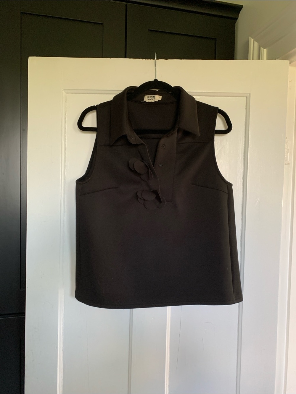 Molly Bracken Black Sleeveless Polo Top with Floral Appliqué